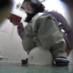 A hidden camera records an unsuspecting Japanese girl as she takes a piss and a shit into a floor toilet. No poop is seen, but we can hear some subtle shitting sounds as well as a lot of grunting and sighing. About 5.5 minutes.